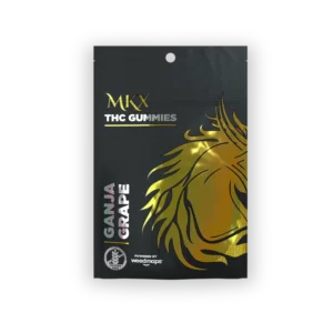 A container of Ganja Grape cannabis edibles, featuring deep purple gummy candies and a clear label indicating the 10mg hybrid dose.