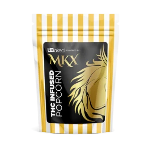 A sealed bag of THC Infused Popcorn, with a clear label showing the product name, hybrid strain, and 100mg THC per serving.